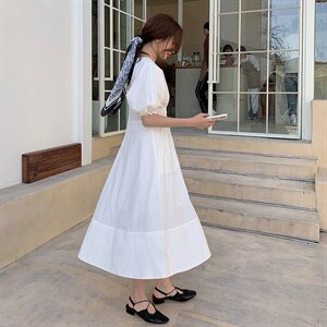 2021夏季新款女装中长款连衣裙简约时尚A字裙V领短袖图片