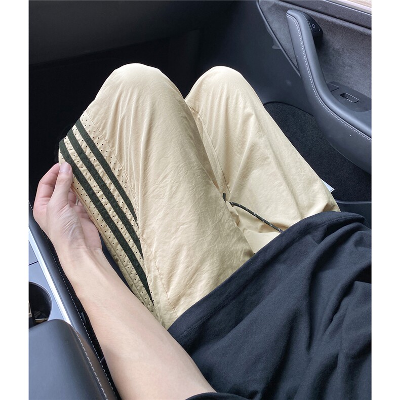 斜条激光打孔拉条洞洞裤抖音可送样A061-AX00732-P50,男装休闲裤,电商A061