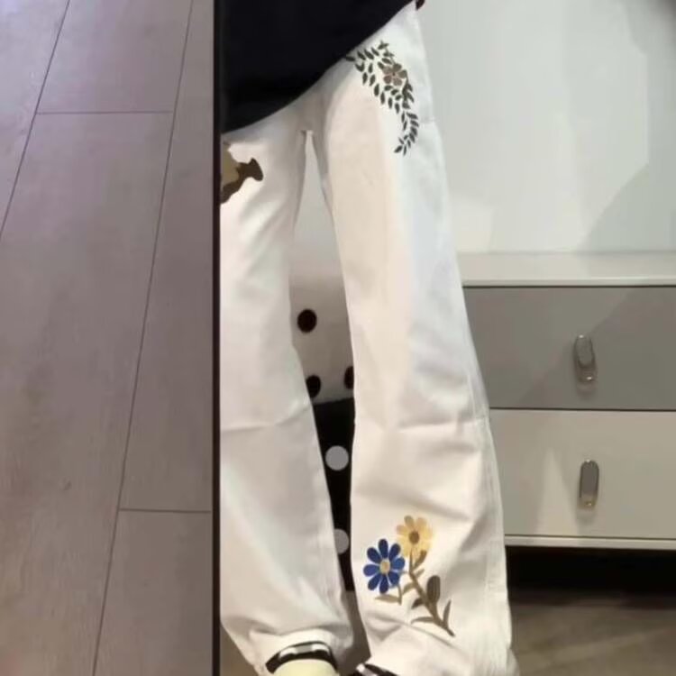 美式高街花朵印花刺绣牛仔裤男女春秋设计感弯刀裤重磅痞帅直筒裤图片