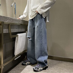 春新款男女高街破洞宽直筒个性潮牌牛仔裤长裤子NZ018 批45 控68图片