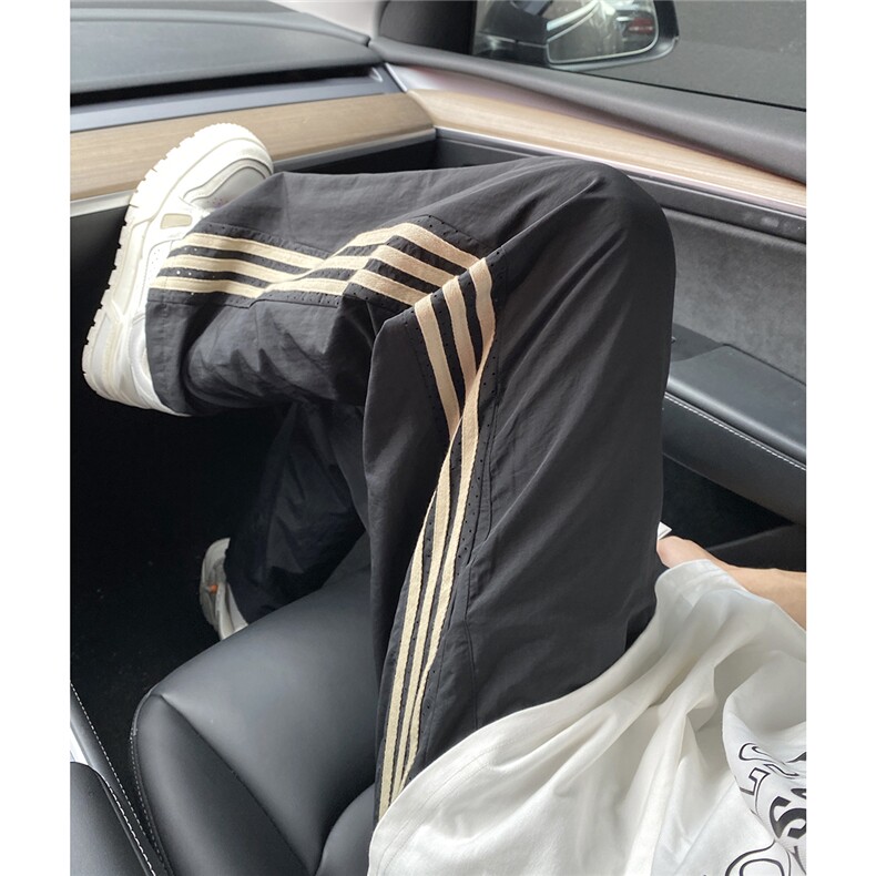 斜条激光打孔拉条洞洞裤抖音可送样A061-AX00732-P50,男装休闲裤,电商A061