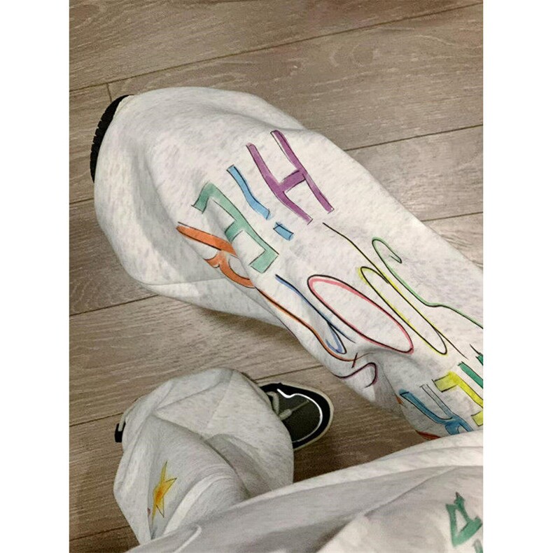 青少年潮印花休闲裤复古涂鸦星星休闲运动卫裤松紧日常 KX66图片