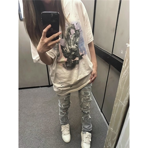 设计款破洞牛仔裤男修身小脚2025秋冬季新款潮流印花休闲裤子
