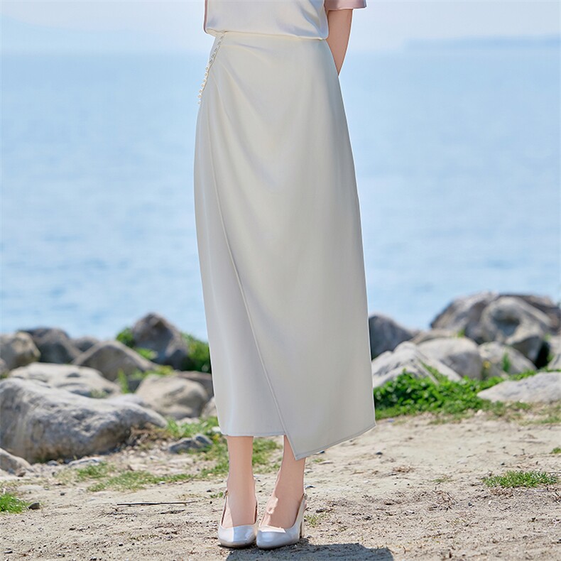 2025夏装设计感不规则高腰中长款百搭钉珠半身裙,女装半身裙,卡杰菲