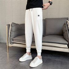 网红潮牌针织卫裤男韩版修身束脚裤纯色休闲运动裤社会小伙裤子图片