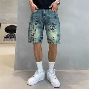 夏季美式休闲痞帅复古涂鸦印花牛仔短裤男宽松个性潮流五分裤子潮图片