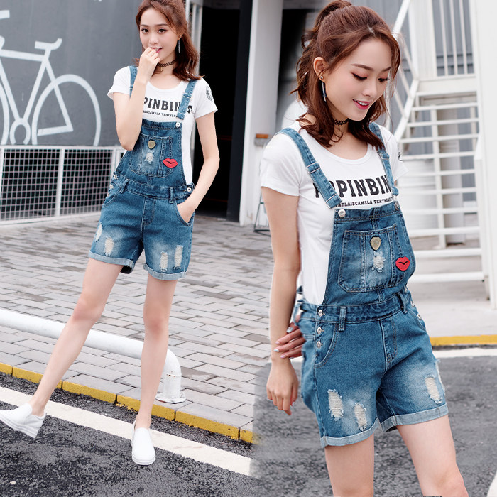 水洗翻边拉链图案纽扣2021年夏季常规短款背带裤高腰磨破连体裤，女装连体裤，奕阳依阁