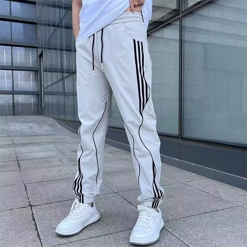 高品质新款春秋男款休闲裤男士束脚弹力条纹拼接潮流MKB24P47,男装休闲裤,星座1013-5