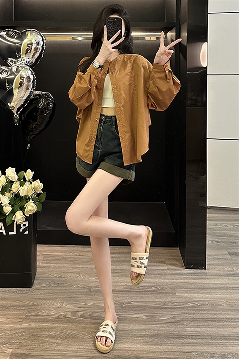 潮牌纯色单排扣春季新款女装炸街设计感小众宽松简约灯笼长袖上衣,女装衬衫,江南