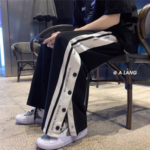 春夏薄款字母排扣设计开衩运动休闲裤图片