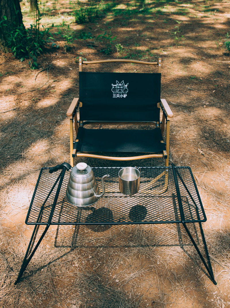 Three little donkeys set up a set of stands camping operation counter stove rack grill grill wrought iron folding table multifunctional working table