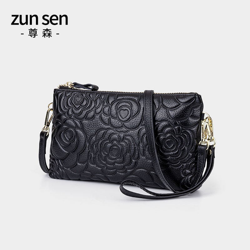 Leather hand-held messenger bag women's 2022 summer new fashion embossed middle-aged mother leather shoulder bag small bag