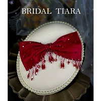 Красная заколка для волос с кисточками с бантиком