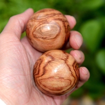 Hainan yellow flower pear wood oil pear old stock health care ball pair of tiger leather tattoo 5 0 hand ball sea yellow handlebar piece hand turning ball