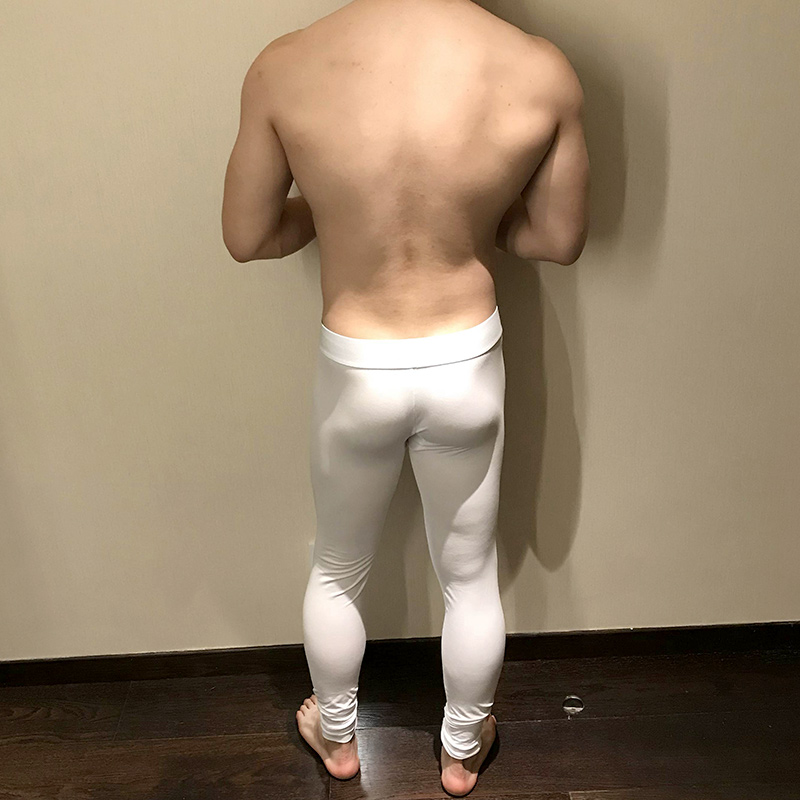 Quần nam mùa thu Cotton Thin One Piece Ấm áp Ấm áp Màu đơn giản Thanh niên bó sát Quần eo thấp Quần cơ quần giữ nhiệt nam lót lông