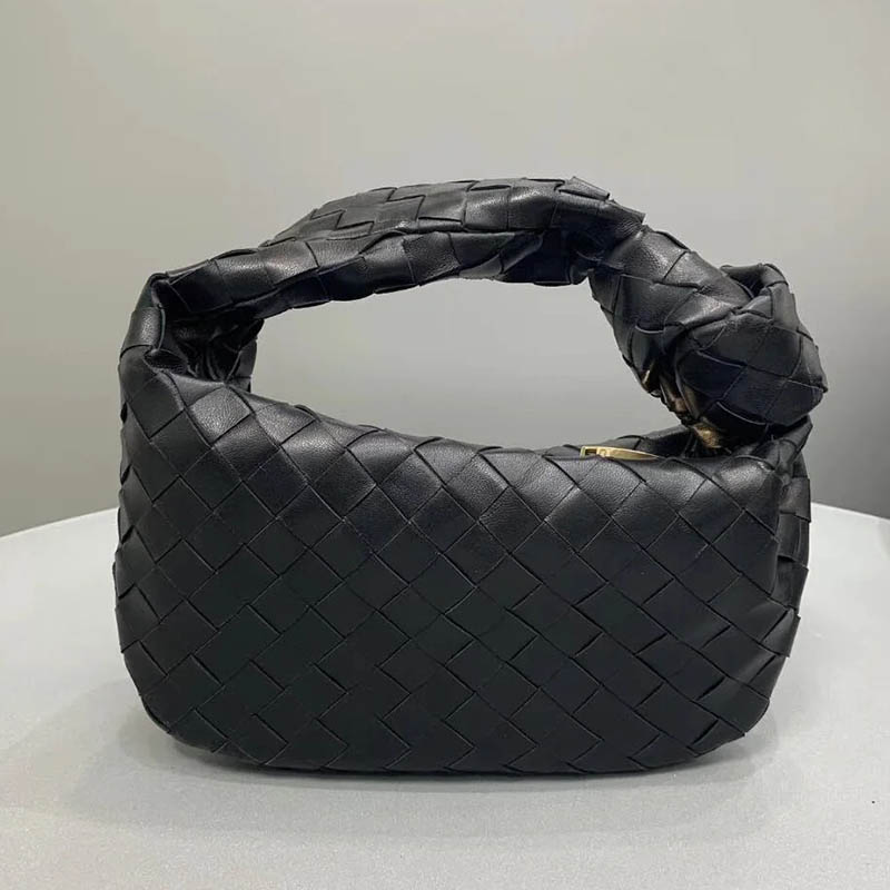 European and American cowhide woven patent leather knotted handle bag women's 2022 new fashion all-match mini small fresh handbag