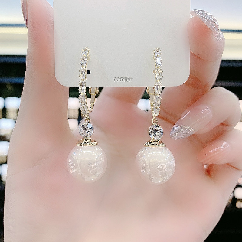 Korea's senior atmosphere with champagne pearl earrings 2022 new tide - red tide - button female