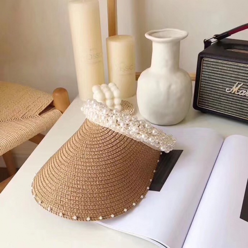 Net red ins handwoven pearl grass hat out of the walking sun Han version empty top hat Little fairy hollowed-out hat