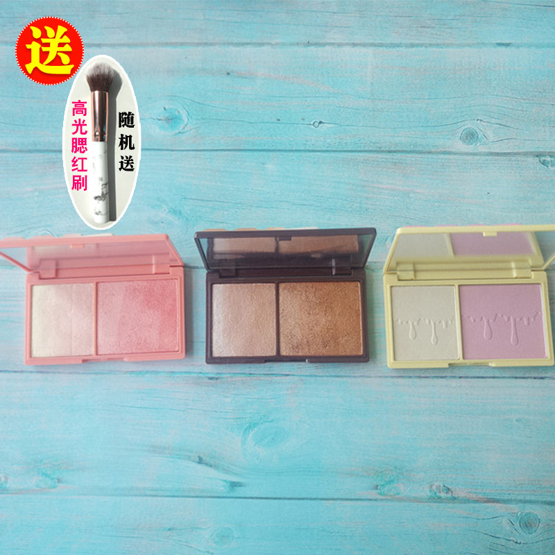 The egg pushes the British Makeup Revolution chocolate gradient high light eye shadow blush disk to shade shadow