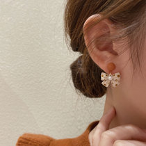 Korean bow earrings 2021 New Tide advanced sense light luxury niche design sense atmosphere earrings female