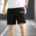 Quần short nam rộng mùa hè quần mỏng bên ngoài mặc thể thao Phong cách Hàn Quốc hoang dã thẳng quần năm điểm giản dị - Quần short