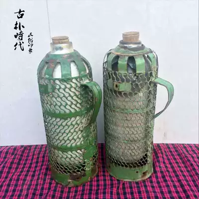 Folk nostalgia Old objects Old-fashioned thermos old thermos pot Green old tin thermos props old goods old goods