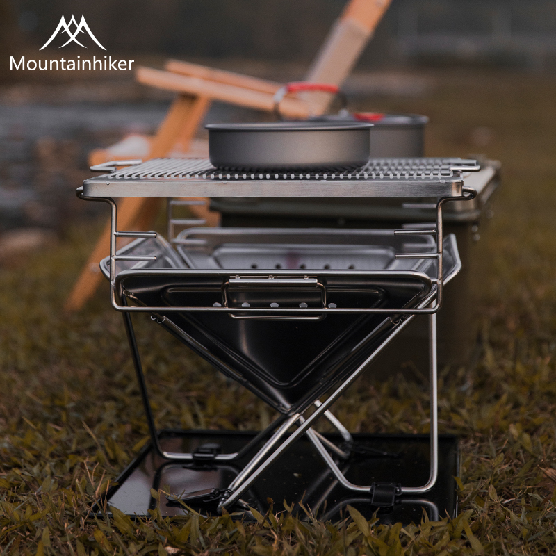 Mountain guest winter new stainless steel outdoor camping field silver grill heating practical four-corner folding fire table