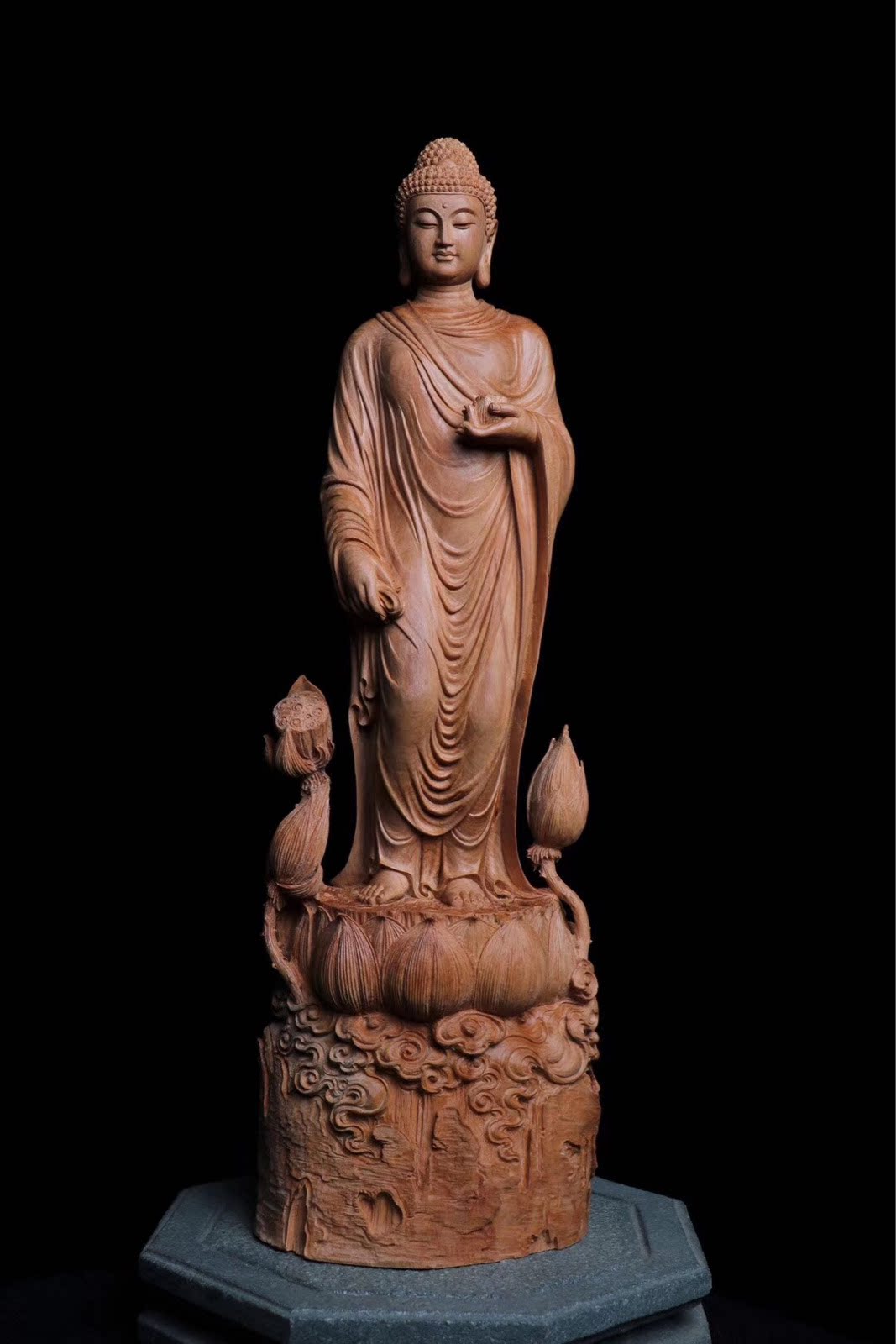 Old mountain wooden statue serving as the Shika Moni Yuen Zukong Tibet Bodhisattva's engraving piece