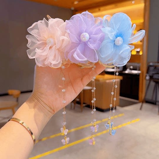 2025年新款网红儿童丸子头太阳花流苏链条抓夹女童盘发神器发饰