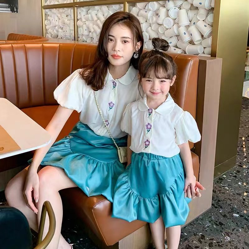 62557 embroidery paternity suit