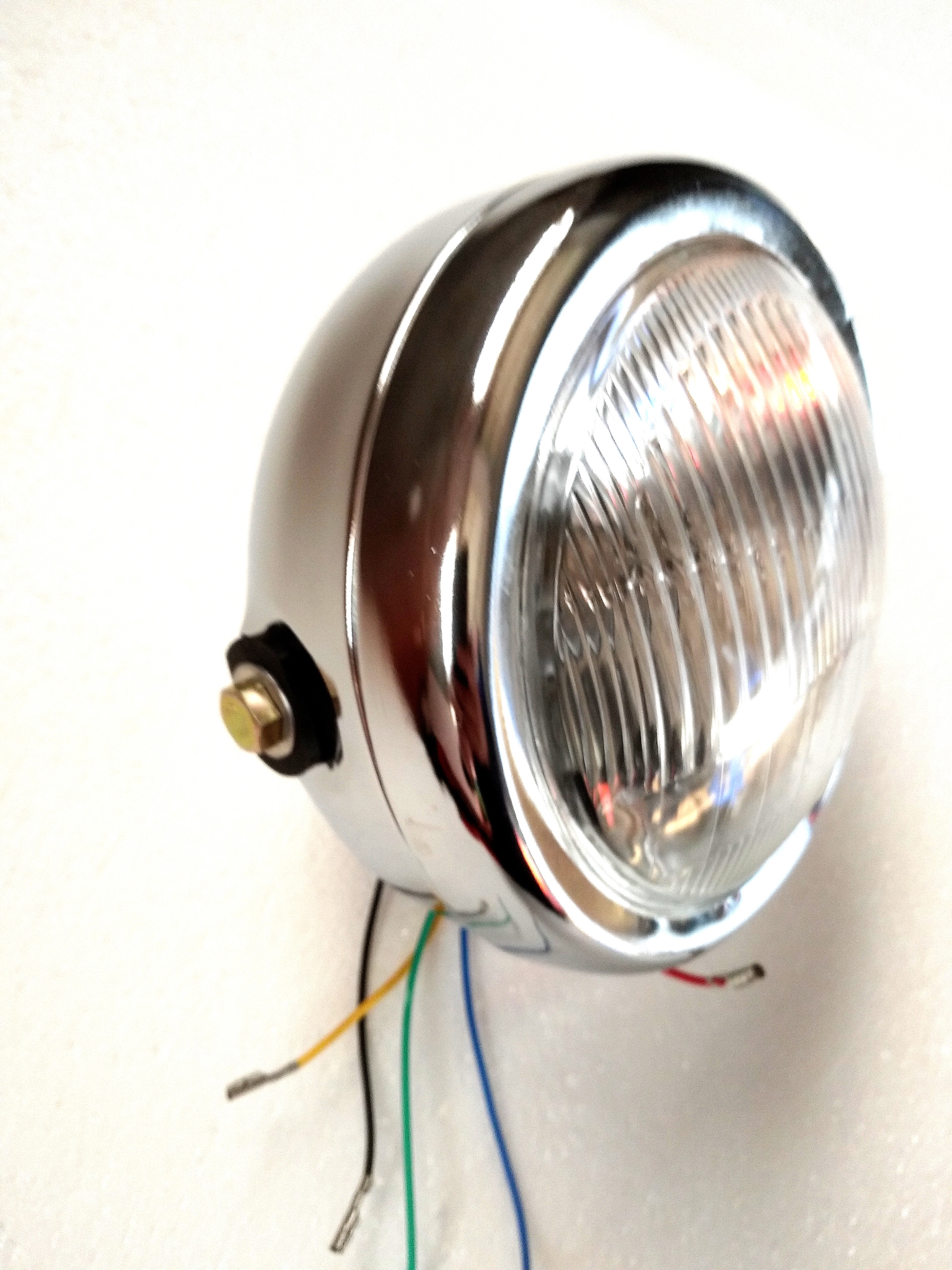 Locomotive accessories suitable for Haojue Suzuki AX100 retro round living room light iron shell electroplating headlight headlight assembly