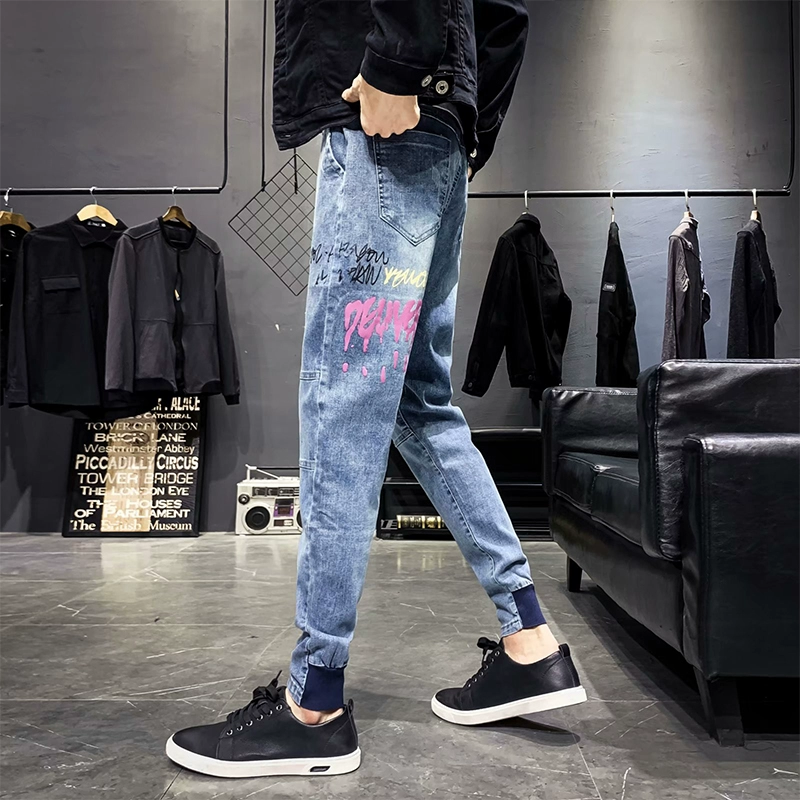 Quần jeans nam dáng lửng đế xuồng phiên bản Hàn Quốc của xu hướng quần tây nam giản dị co giãn quần chín màu sáng màu - Quần jean