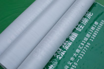 Manufacturers produce custom green forest decoration ground protective film weaving fabric thicking special film protection