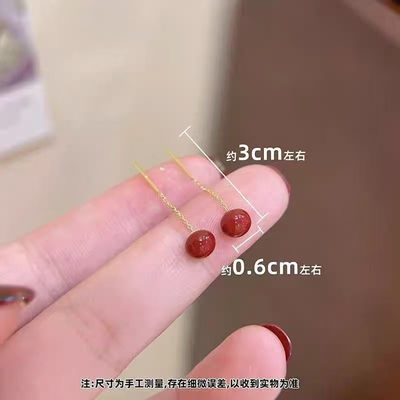 Angela red bead ear strings are a niche, light luxury, fashionable, anti-allergy, exquisite and simple choice for women wearing earrings during the Spring Festival