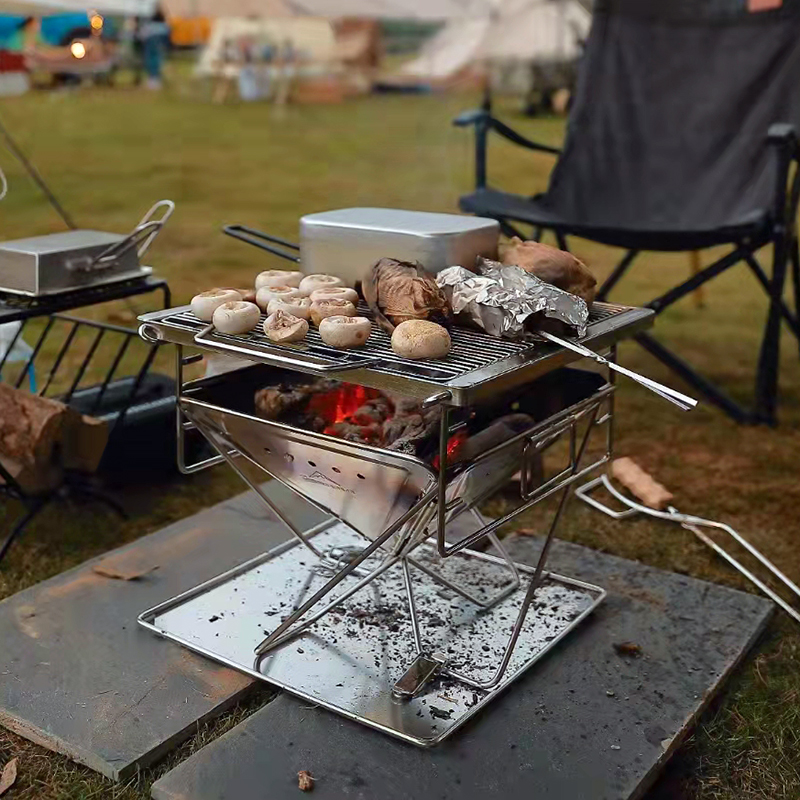 Coleman stainless steel folding light grill fire rack outdoor camping picnic barbecue firewood charcoal stove