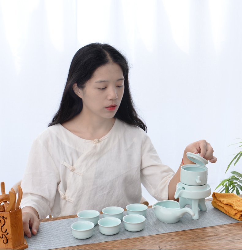 Fujian macro thick ceramic tea set suits for domestic half automatic stone mill lazy kung fu tea tea caddy fixings tea cup