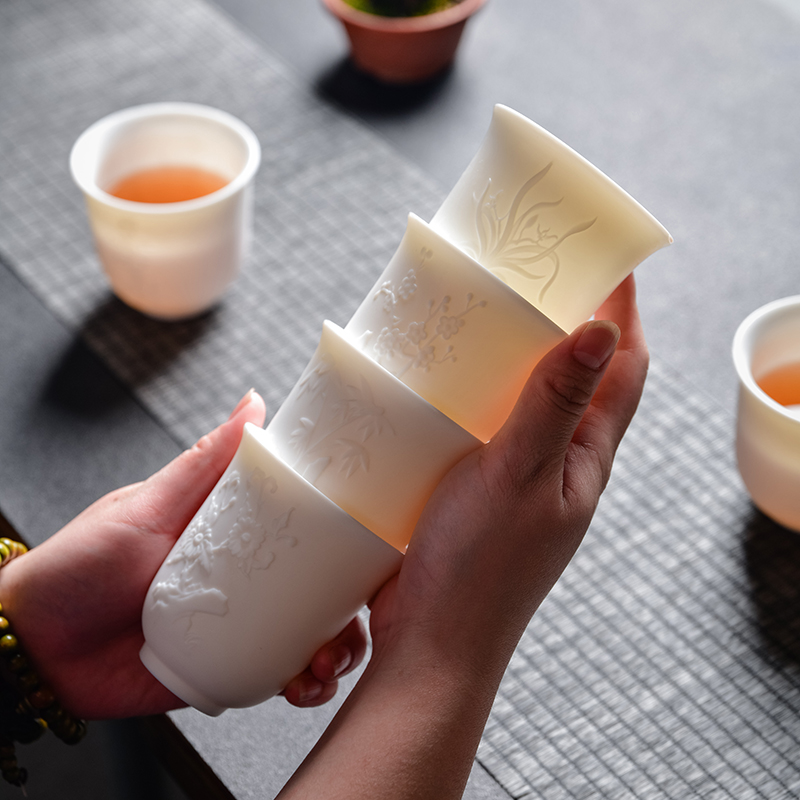 Dehua suet jade white porcelain tea cups biscuit firing embossment master single cup cup bowl large ceramic kung fu tea set