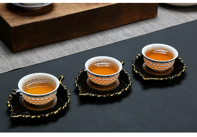 Fujian blue and white and exquisite kung fu tea set ceramic honeycomb hollow out macro tea sea teapot teacup of a complete set of accessories