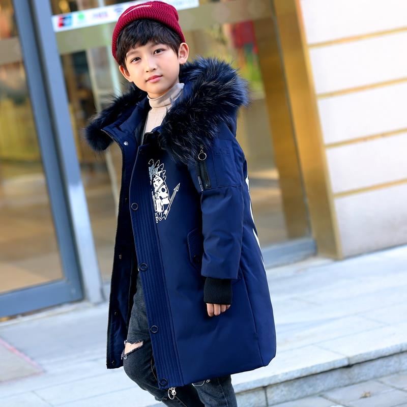 xuống áo khoác dài vừa dài vừa boy 2018 mới mùa đông Hàn Quốc phiên bản trẻ em Anti-mùa của dày cổ áo lông lớn 々.