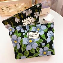 2021 new makeup storage bag wash bag flower large capacity cosmetic bag female portable niche travel storage bag