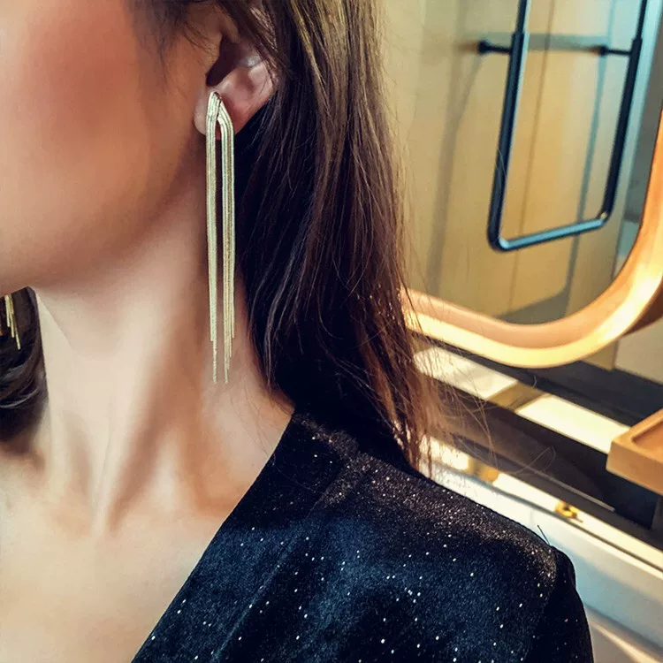 Golden earrings with tassels
