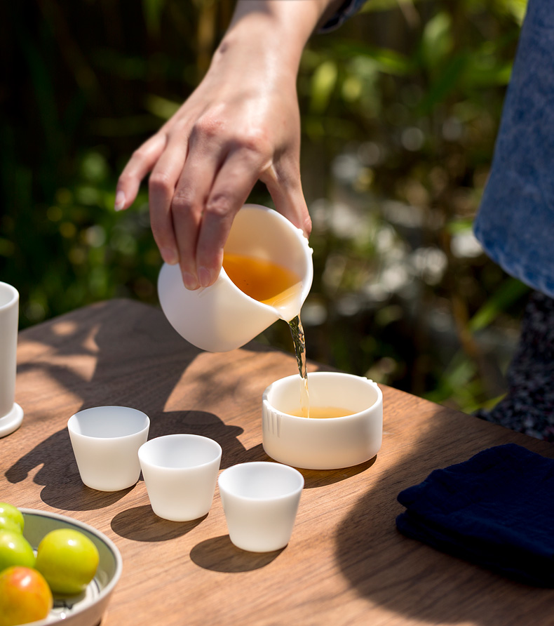 Tang dehua white porcelain cup to crack a pot of the third cup second cup travel portable kung fu tea set car is suing tea cups