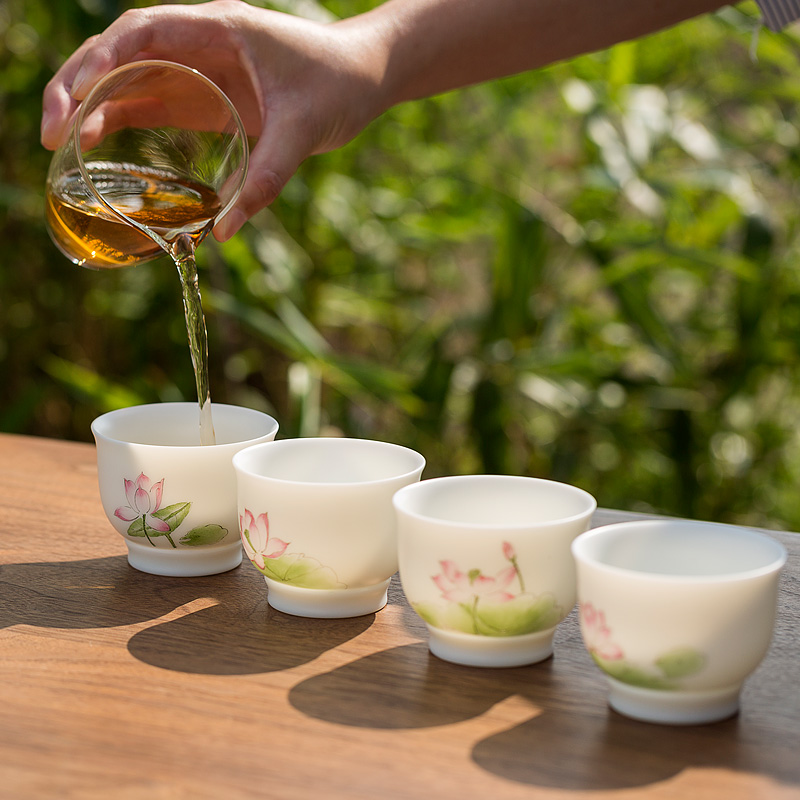 Tang dehua white porcelain shed suet jade hand draw lotus tea cup, bowl of household kung fu tea set personal sample tea cup