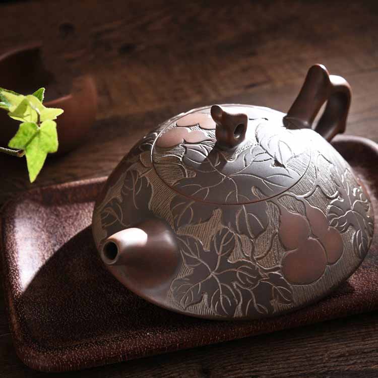 Creator qinzhou nixing pottery mud TaoChun manual high - capacity gourd pot of ferro, lotus leaf tea cups can form a complete set of tea sets