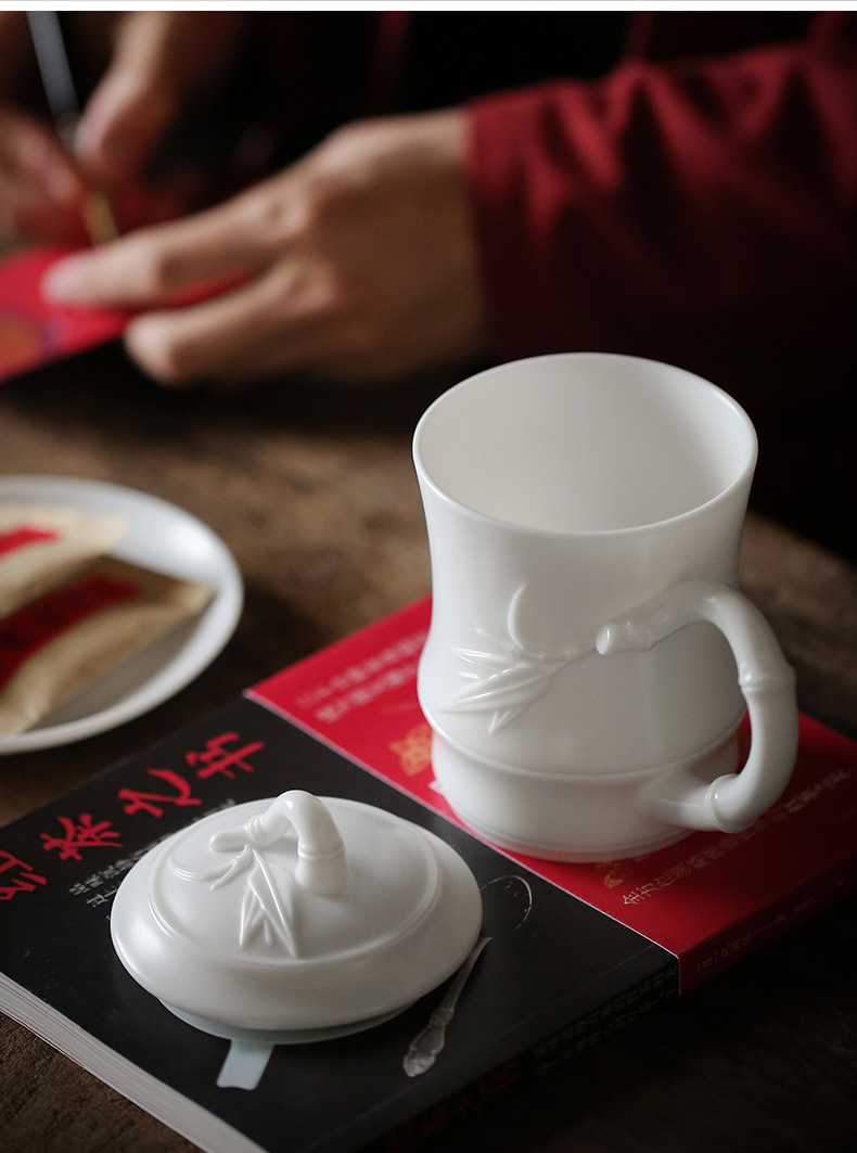 Dehua high white porcelain cup tea cup with cover ceramic office cup with handle tea cup and a cup of tea