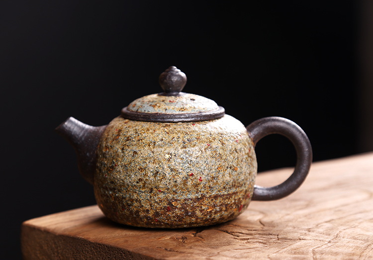 Ancient undressed ore Taiwan sheng up manually lava coarse pottery tea teapot to burn natural fire rock ore ball hole, single pot