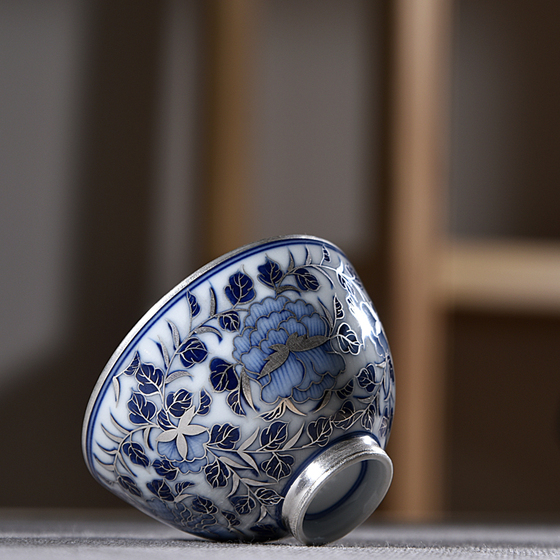 The ancient sheng up new riches and honor peony coppering. As silver sample tea cup 99 sterling silver, jingdezhen porcelain hand kung fu master CPU