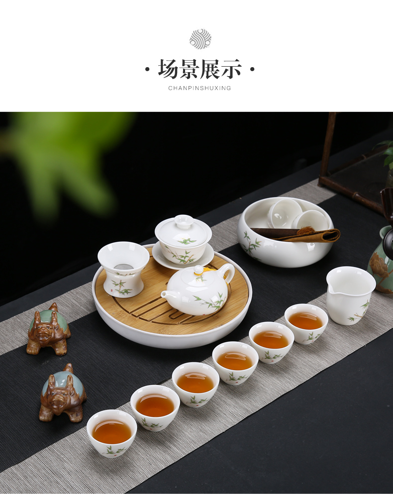 Dehua white porcelain kung fu tea set suit household suet jade cups of a complete set of the tea pot lid to use simple wooden side