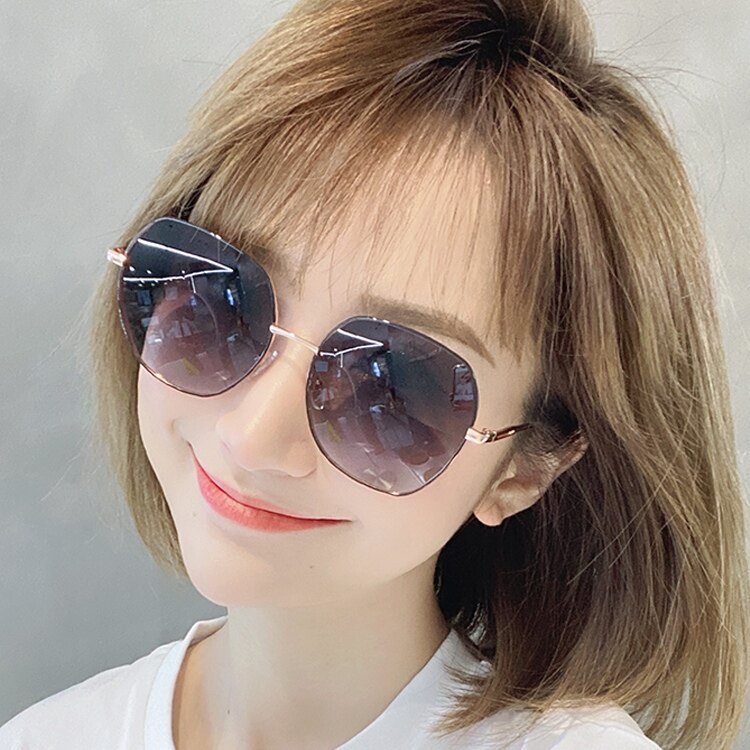 Hong Kong I TGREG new fashion personality avant-garde women's round face anti-ultraviolet polarized sunglasses seaside summer