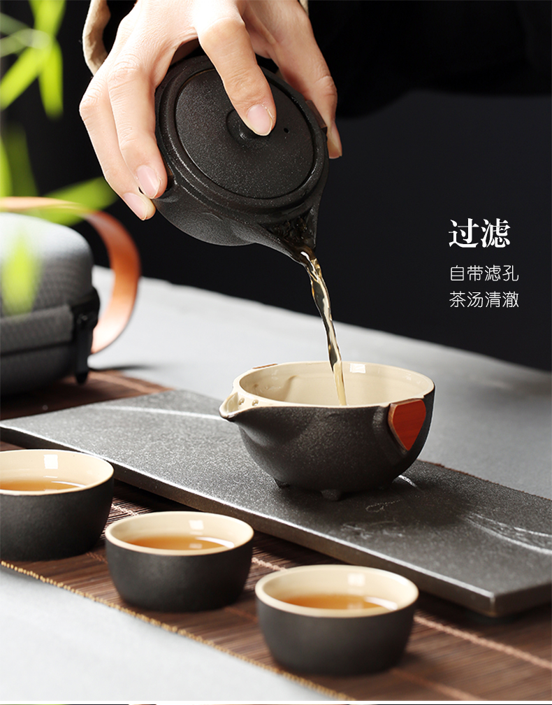 Black pottery travel kung fu tea set to crack a pot of four cups of small portable bag outside Japanese mini household contracted